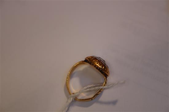 A late 17th century gold and Stuart crystal memento mori ring, size J.